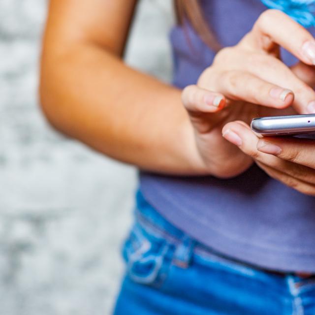 Young person using smartphone