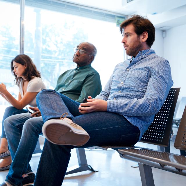 People in a surgery waiting room UK